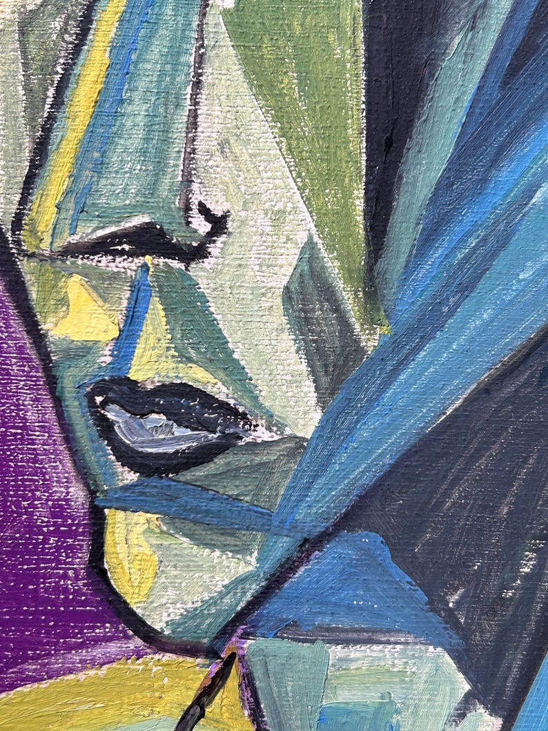 May include: Abstract painting of a face with blue, green, yellow, and black paint. The face is partially obscured by a blue and black shape.