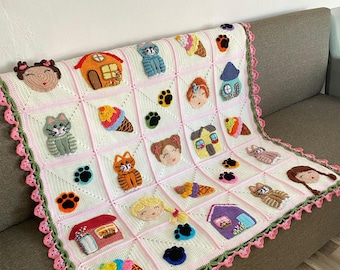 May include: A handmade crochet blanket featuring a patchwork design with various appliqued motifs. The blanket showcases squares with images of houses, cats, ice cream cones, faces, and paw prints. The border is a scalloped design in pink and green.
