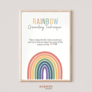 May include: A printable poster with a rainbow graphic and the text "RAINBOW Grounding Technique". The text below the rainbow reads "Take a deep breath, look around you and try to find an object for each of the colours of the RAINBOW". The poster also includes the text "pygmee studio" at the bottom.