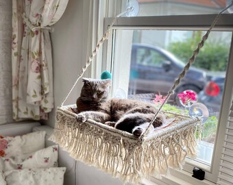 cat bed attached to window