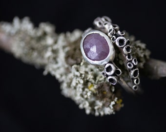Botanical stack rings with a berry red sapphire