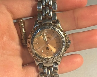 Vintage 90s Fossil Women's Rose Gold Blue Brand Watch  *not in working condition. Sold AS IS as a vintage item and accessory*