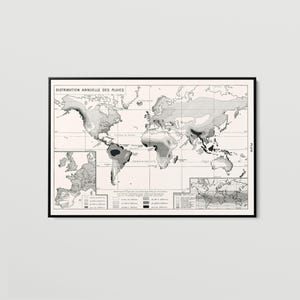 May include: A black and white framed wall map titled DISTRIBUTION ANNUELLE DES PLUIES, displaying global annual rainfall patterns with varying shades of gray, a legend, and inset maps of Europe and the world on a light background.