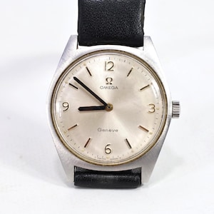 Omega Geneve 1970s Wristwatch | Vintage 34mm Watch | Brushed Steel Case | Classic Timepiece | Collector&#39;s Item