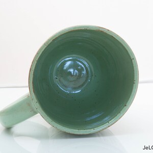 Spring green mug with whimsical carvings image 5
