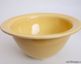 Handmade ceramic berry bowl in bright yellow, great for a fruit bowl, serving bowl, anniversary gift, or anything else