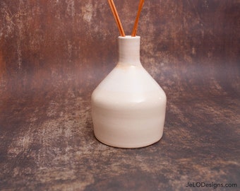 Handmade ceramic linen white vase ready for your sweet small flower bouquet.