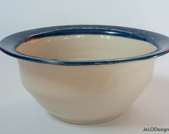 Handmade ceramic white bowl with a crisp deep blue rim, great for a fruit bowl, serving bowl, anniversary gift, or anything else