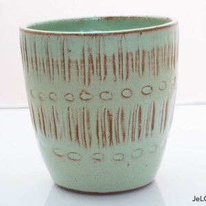 Spring green mug with whimsical carvings image 4