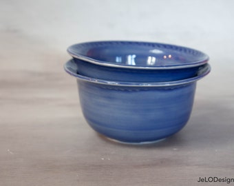Handmade blue ceramic bowl set serving, fruit, mail, or anything else
