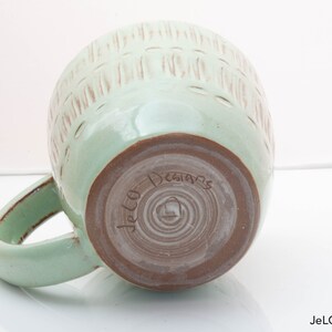 Spring green mug with whimsical carvings image 6