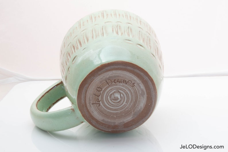 Spring green mug with whimsical carvings image 6