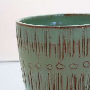 Spring green mug with whimsical carvings image 3