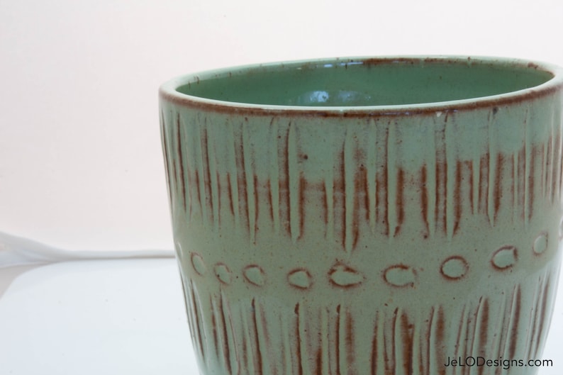 Spring green mug with whimsical carvings image 3