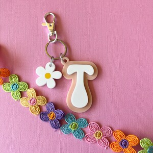 Retro Letter Groovy Key Ring with daisy