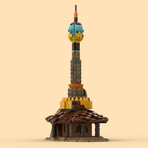 Könnte beinhalten: Ein brauner, beiger und blauer Lego-Turm mit einem spitzen Dach und einem kleinen Gebäude an der Basis.