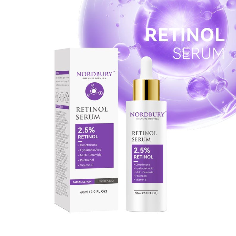 May include: A white and purple box and bottle of Nordbury Retinol Serum. The box and bottle have the words "Retinol Serum" and "2.5% Retinol" printed on them. The bottle has a dropper and gold cap. The box and bottle are against a purple background.
