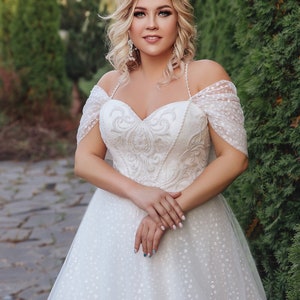 Plus Size off shoulder style wedding dress with beaded straps, sweetheart neckline, sparkling tulle glitter dot, curvy bride wedding dress