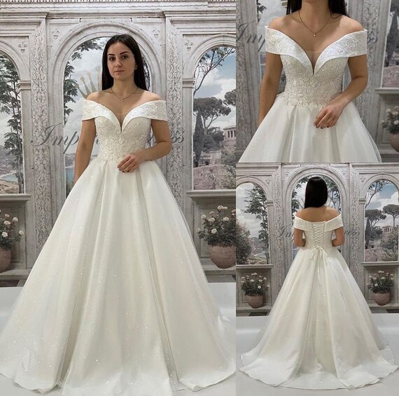 Wedding dress with lace bodice top
