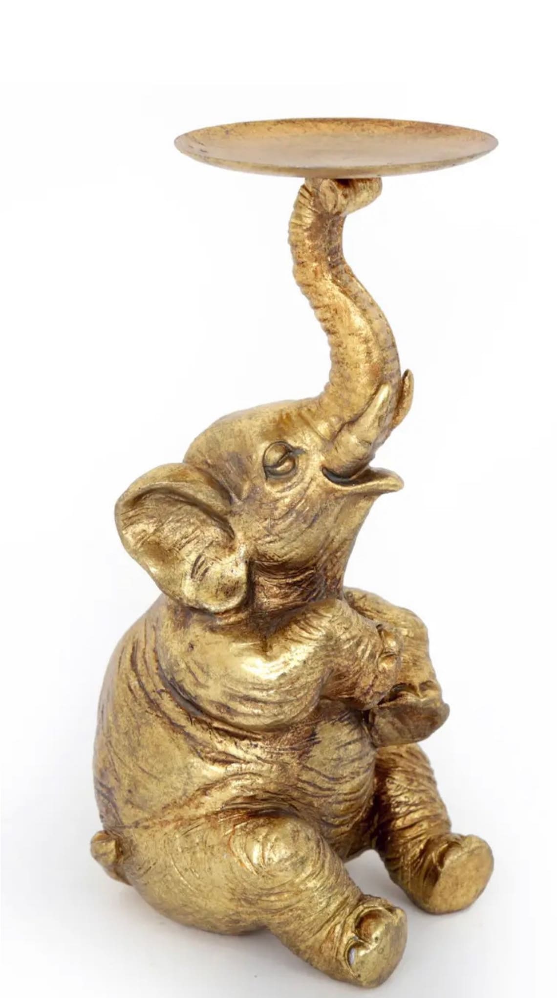 A beautiful intricate gold elephant pillar candle holder Etsy