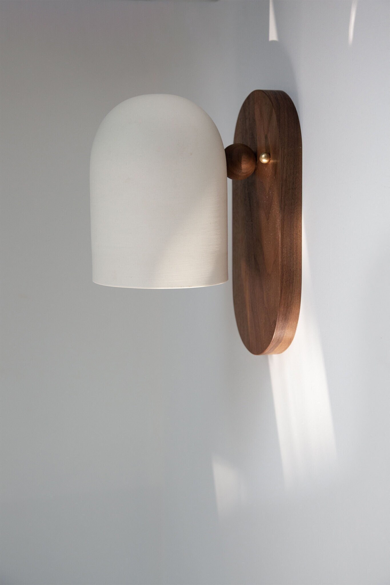 Schwung odyssey outlet wall sconce
