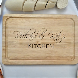 Personalised Wooden Chopping Board Engraved with a Couple's Names
