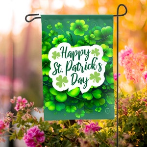 May include: A green garden flag with a white circle containing the text "Happy St. Patrick's Day" surrounded by green shamrocks.