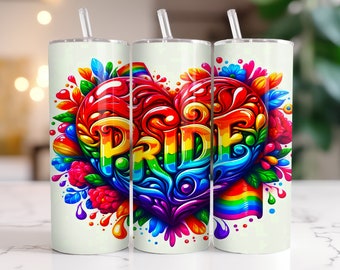 May include: A white tumbler with a colourful design featuring the word "PRIDE" in a rainbow heart shape surrounded by flowers and rainbow stripes.
