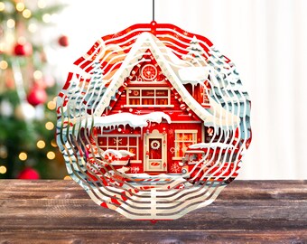 Peut inclure: Un mobile en métal rouge et blanc avec un motif de maison recouverte de neige. La maison a une porte et des fenêtres rouges, et il y a des arbres et de la neige sur le toit. Le mobile est suspendu à une ficelle.