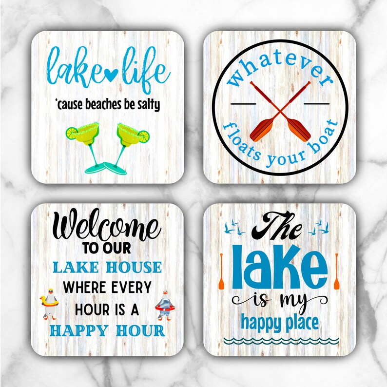 May include: Set of four square coasters with a wood grain background and blue and white text. The coasters feature lake-themed sayings, including "lake life 'cause beaches be salty", "whatever floats your boat", "welcome to our lake house where every hour is a happy hour", and "the lake is my happy place".