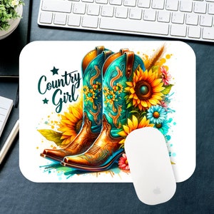 May include: A white mouse pad with a colorful design of cowboy boots, sunflowers, and the text "Country Girl".