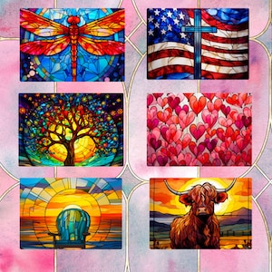 May include: A collage of 12 stained glass style images. The images include a sunset over the ocean, a dragonfly, an American flag with a cross, a starry night sky, a red truck in a snowy scene, a tree with a sun behind it, a pattern of hearts, a wolf howling at the moon, a hot air balloon, a sunset with a chair, a Highland cow, and an octopus.