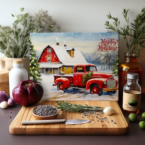 May include: A red vintage pickup truck with a Christmas wreath on the front bumper is driving through a snowy winter scene. The truck is in front of a red barn with a white roof. The text "Happy Holidays" is written in red cursive on the right side of the image.