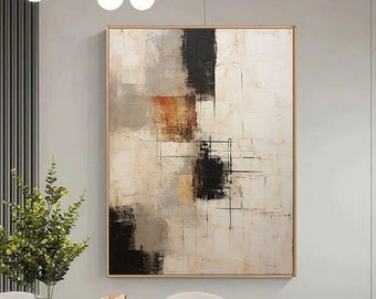Könnte beinhalten: Abstraktes Gemälde mit weißem Hintergrund und schwarzen, braunen und orangefarbenen geometrischen Formen. Das Gemälde ist in einem goldenen Rahmen gerahmt und hängt an einer weißen Wand.