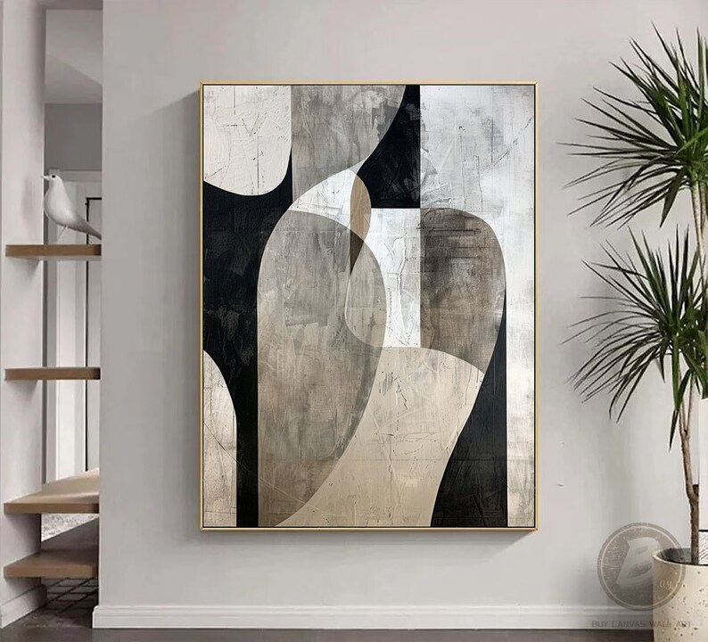 May include: Abstract art painting with geometric shapes in black, white, and brown tones. The painting has a textured surface and a gold frame.