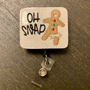 Oh snap, gingerbread man badge reel