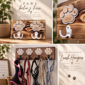 May include: A rectangular wooden wall-mounted leash hanger featuring multiple paw-shaped wooden plaques with the names Juno, Mindy, Dave, Spud, and Jess engraved. The board includes white or black metal hooks and text reading PAWS belong here.