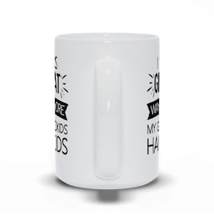 May include: White ceramic mug with black text that reads "It's great to be a grandma, I want to spoil my grandkids, haha".