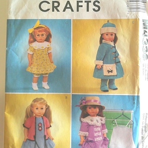 May include: A McCall's Crafts sewing pattern featuring four dolls in various outfits. The dolls are dressed in dresses, coats, and hats, with a white garment on a hanger. The pattern includes the text "MCCALL'S CRAFTS".