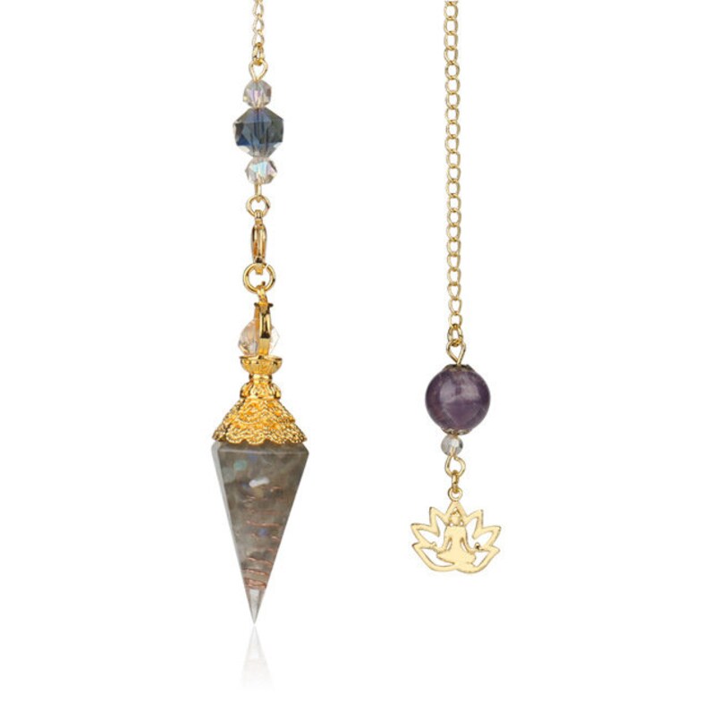 May include: Two gold-colored pendulums. One features a faceted, gray-green crystal point with gold filigree and a chain with blue and clear beads. The other has a purple sphere and a lotus flower charm.
