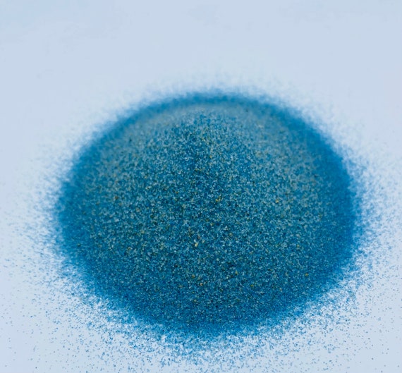 Hellblauer dekorativer Farbsand