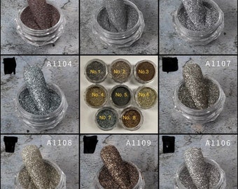 May include: Nine small jars of glitter in various colors, including silver, gold, brown, and black. The jars are labeled with numbers 1 through 8.
