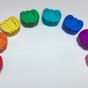 Doorschijnende pompoenen van regenbooghars