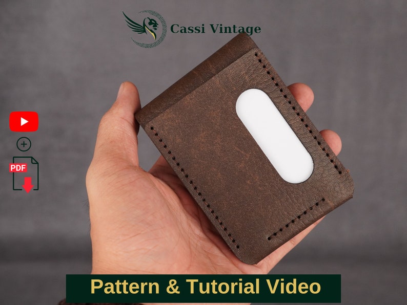 May include: A brown leather wallet with a white accent, held in a hand. The wallet has a stitched border and a rectangular cutout. The image includes the text "Pattern & Tutorial Video" and the Cassi Vintage logo.