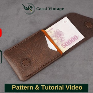 May include: A brown leather wallet with a button closure, holding a Vietnamese 50,000 Dong bill. The wallet is open, revealing the bill. The text "Pattern & Tutorial Video" is at the bottom.