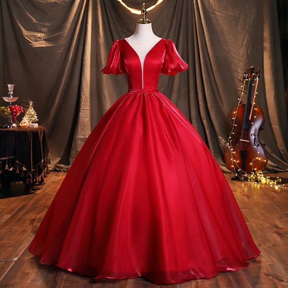 27 Red Wedding Dresses That Are Showstopping (and Shoppable)