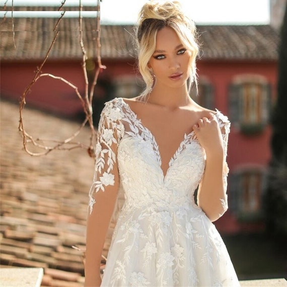 V Neck Backless A Line Long Sleeve Bridal Dress With Sheer Lace Applique  And Long Sleeves Sexy And Classic From Chic_cheap, $180.34
