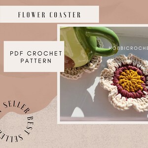 May include: Crocheted flower coasters with a cream-colored petal design, a burgundy inner ring, and a yellow center. The image includes the text "Flower Coaster" and "PDF Crochet Pattern". A green mug rests on one of the coasters.