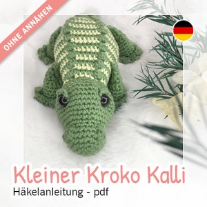 Könnte beinhalten: Häkelanleitung für ein kleines grünes und weißes Krokodil-Amigurumi-Spielzeug. Das Muster heißt "Kleiner Kroko Kalli" und ist als PDF-Download erhältlich.
