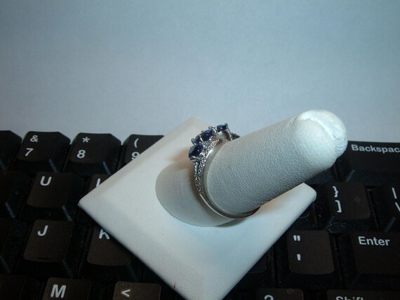 Sterling silver ring featuring three oval blue sa… - image 6